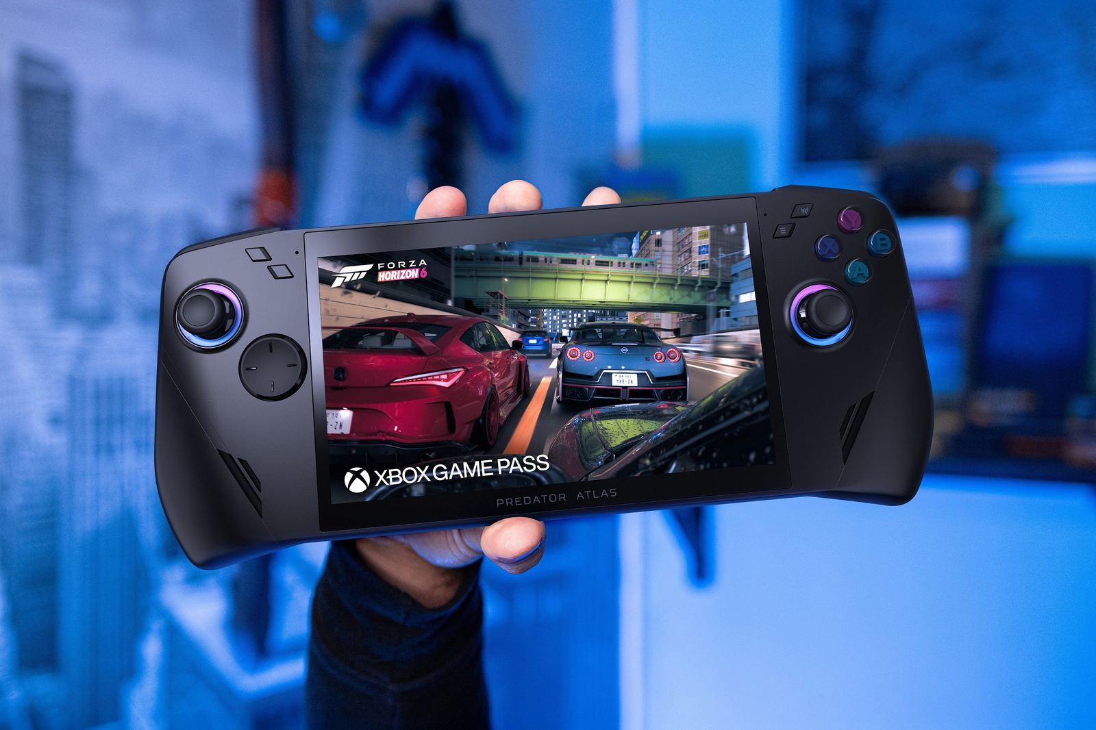 A hand holding the black Predator Atlas 7 handheld, with Forza Horizon 6 and Xbox Game Pass on screen