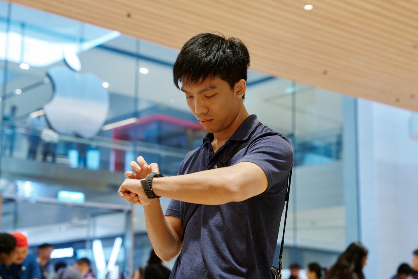 A customer tries Apple Watch Ultra 4 inside an Apple Store
