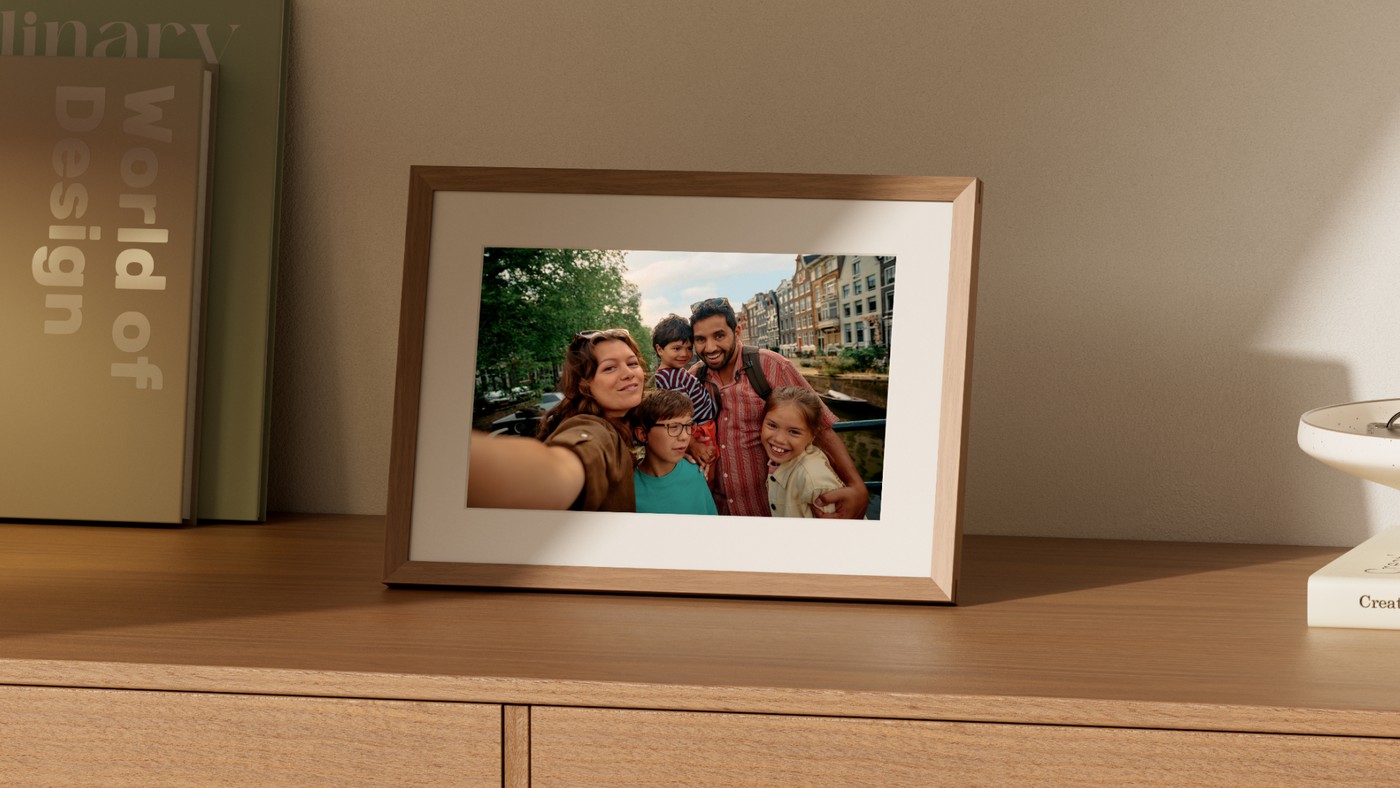 The Alexa Photo Frame, with real wood framing and a soft-white mat.