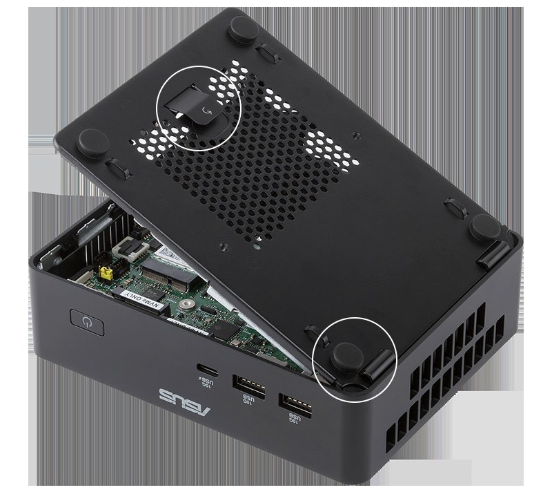 Tool-free bottom panel on an ASUS mini PC chassis showing internal storage access