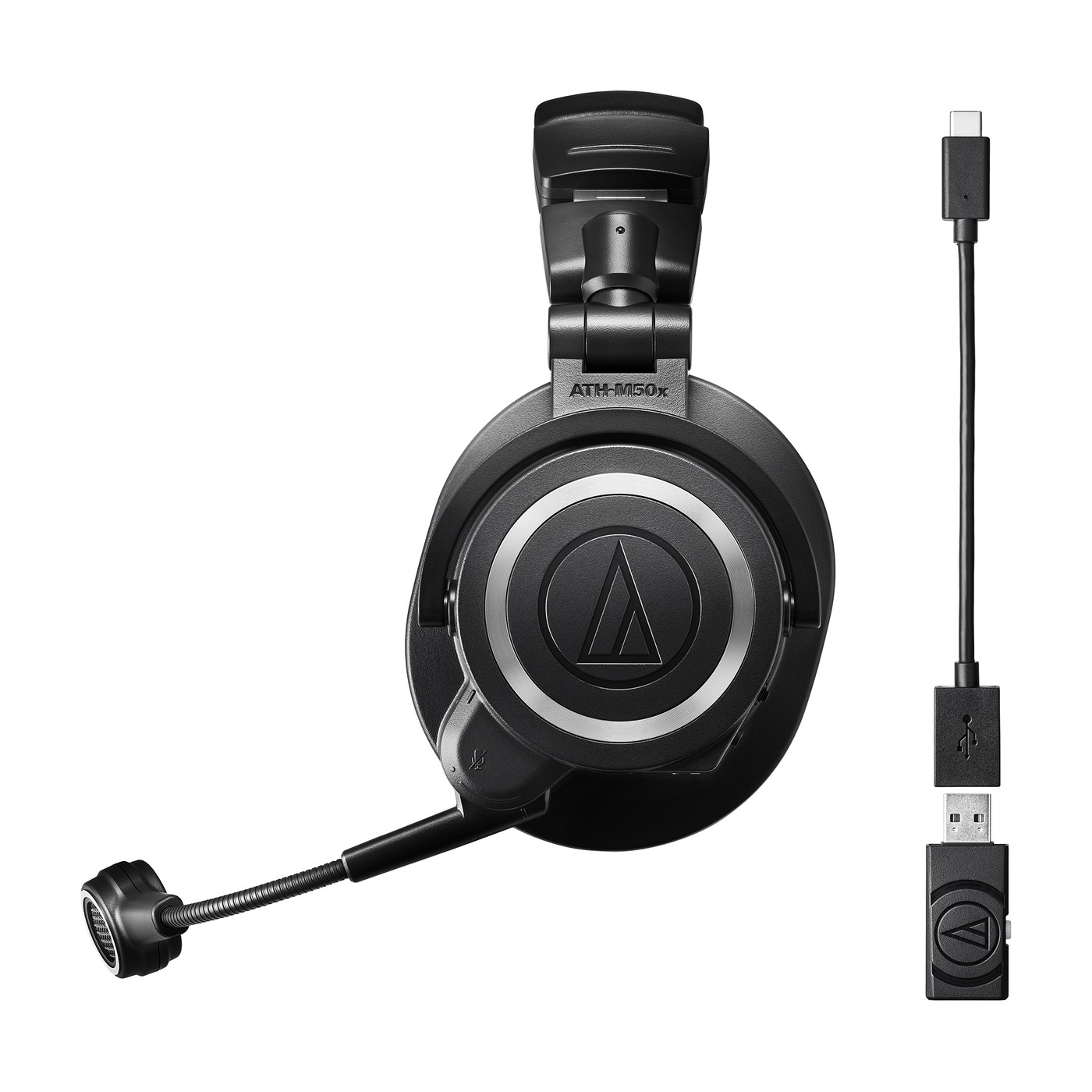 The headset with its USB transceiver and charging cable.