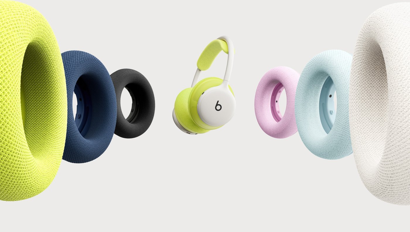 Beats 360 headphones in lime and white between colorful Performance Knit cushions