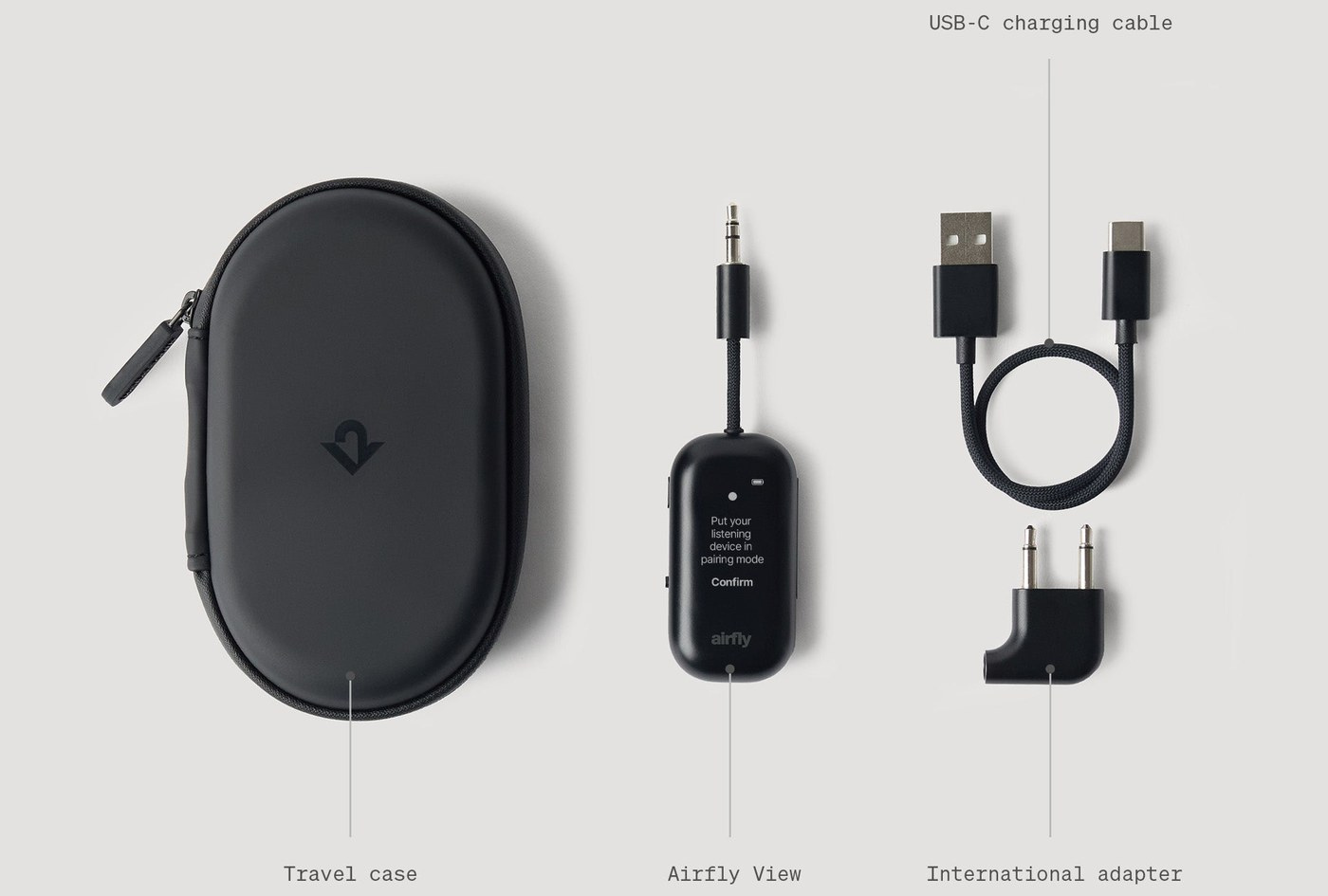 What comes in the box: the travel case, the Airfly View, a USB-C charging cable and the international airline adapter.