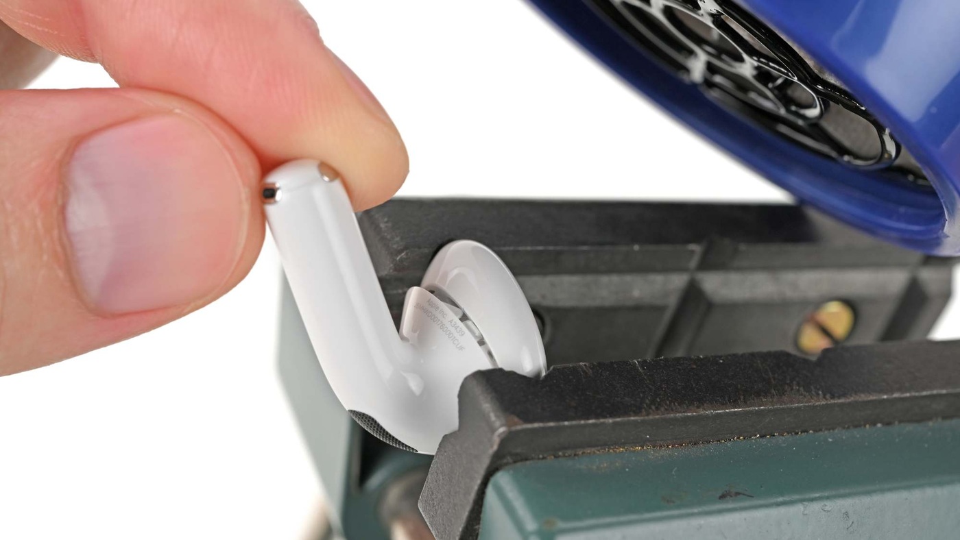 A hair dryer on low heat and a clamp were enough to open an AirPods 5 earbud