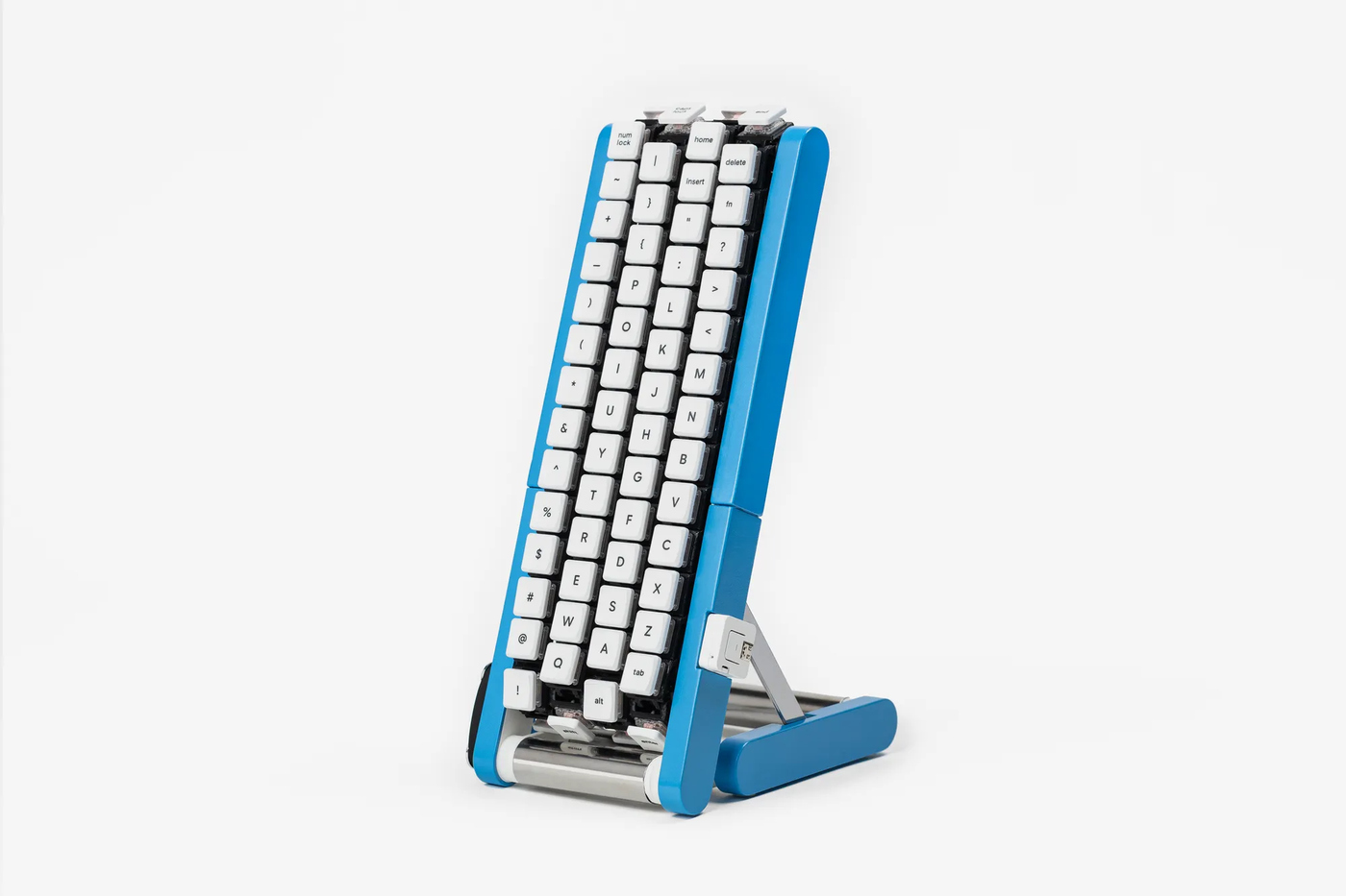 The Gboard Kurukuru Version stands upright on a folding stand, its four belts of keys facing the typist.