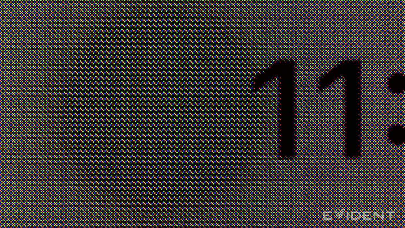 Under iFixit’s microscope, a faint circle of thinner pixels appears beside the clock on an iPhone 18 Pro display