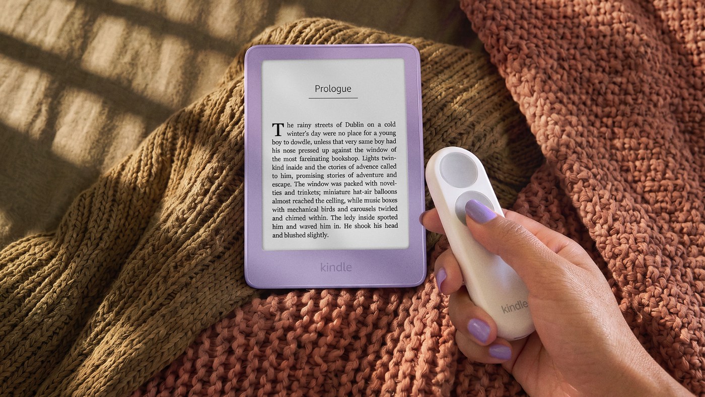 New Kindle in Ube with the Kindle Click Bluetooth page-turn remote in hand
