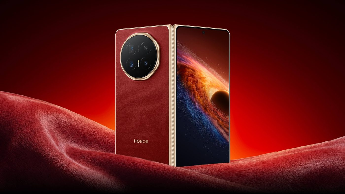 Honor Magic V6 in red and gold, half open on a red backdrop