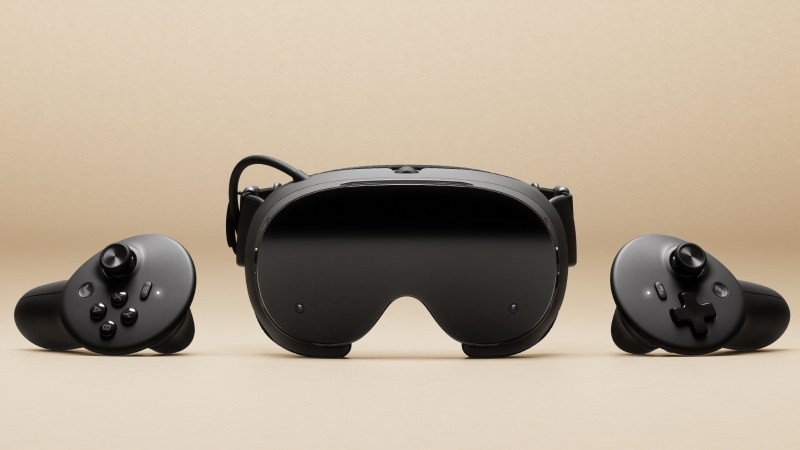 Steam Frame headset and controllers on a beige backdrop