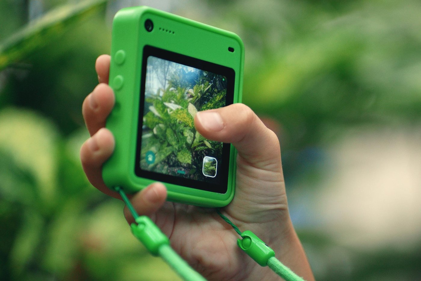 Close-up of lime Freckle handset with Discovery Camera viewfinder outdoors