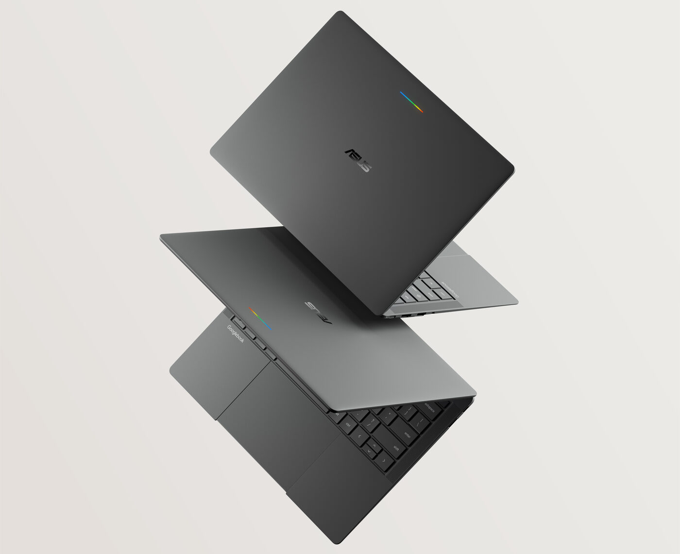 Two Asus Googlebook 14 units stacked, showing lid Glowbar and Googlebook palm rest