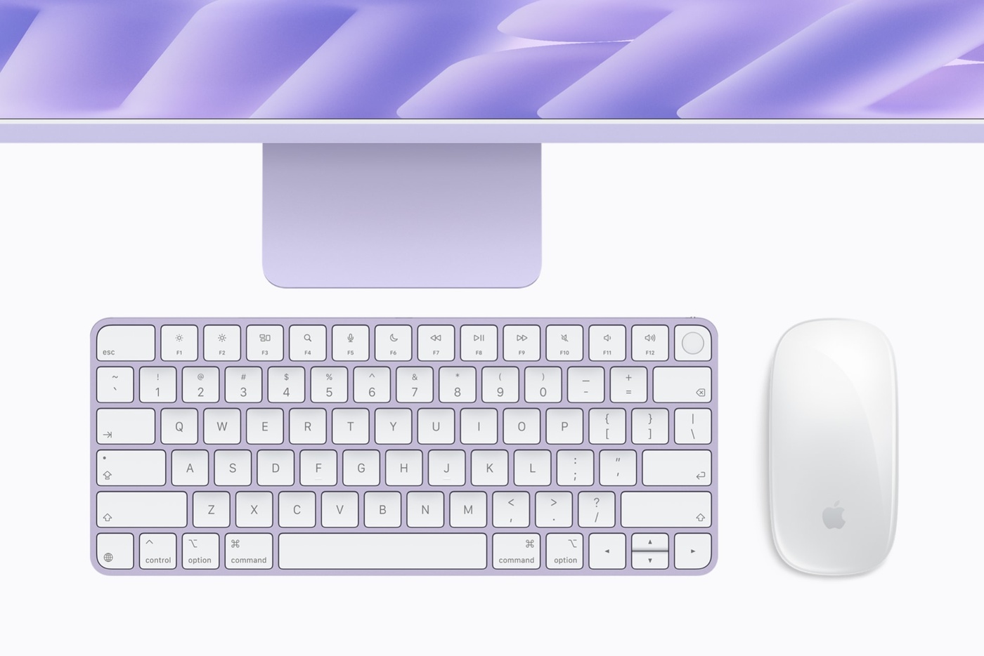 The iMac ships with a color-matched keyboard and mouse.