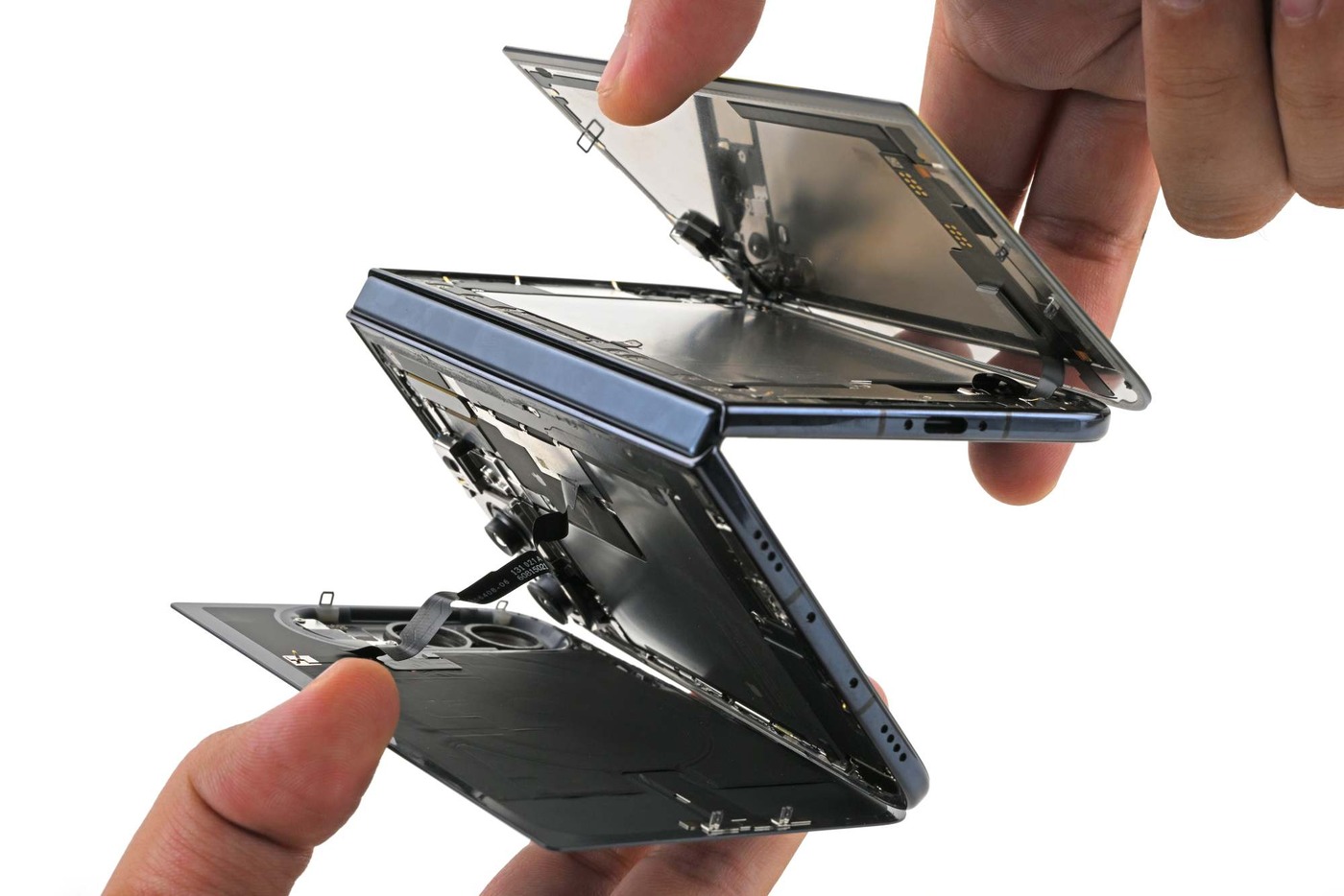 iFixit's iPhone Duo, opened up during the teardown.