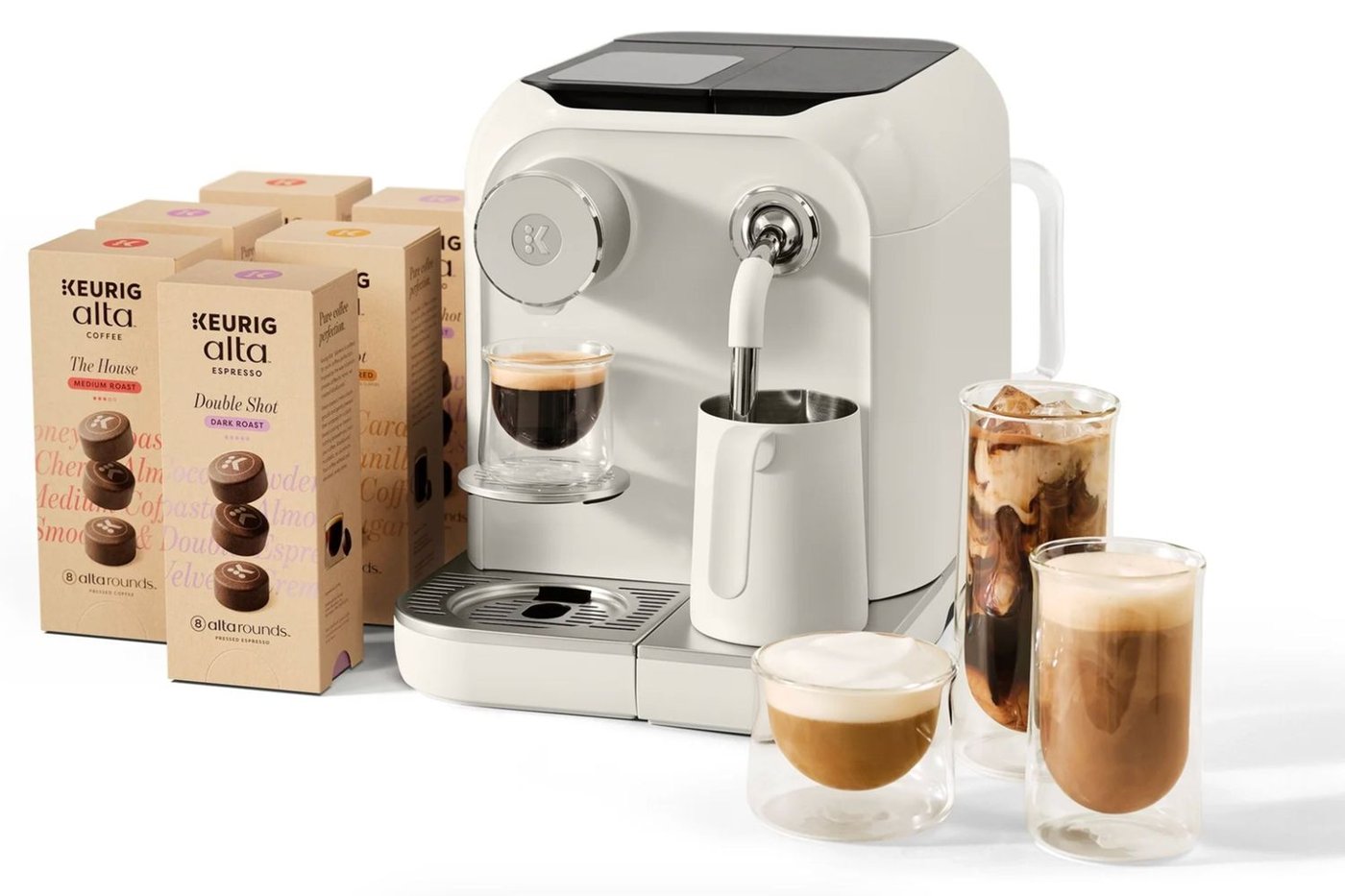 Keurig Alta coffee machine with AltaRounds cartons and sample drinks