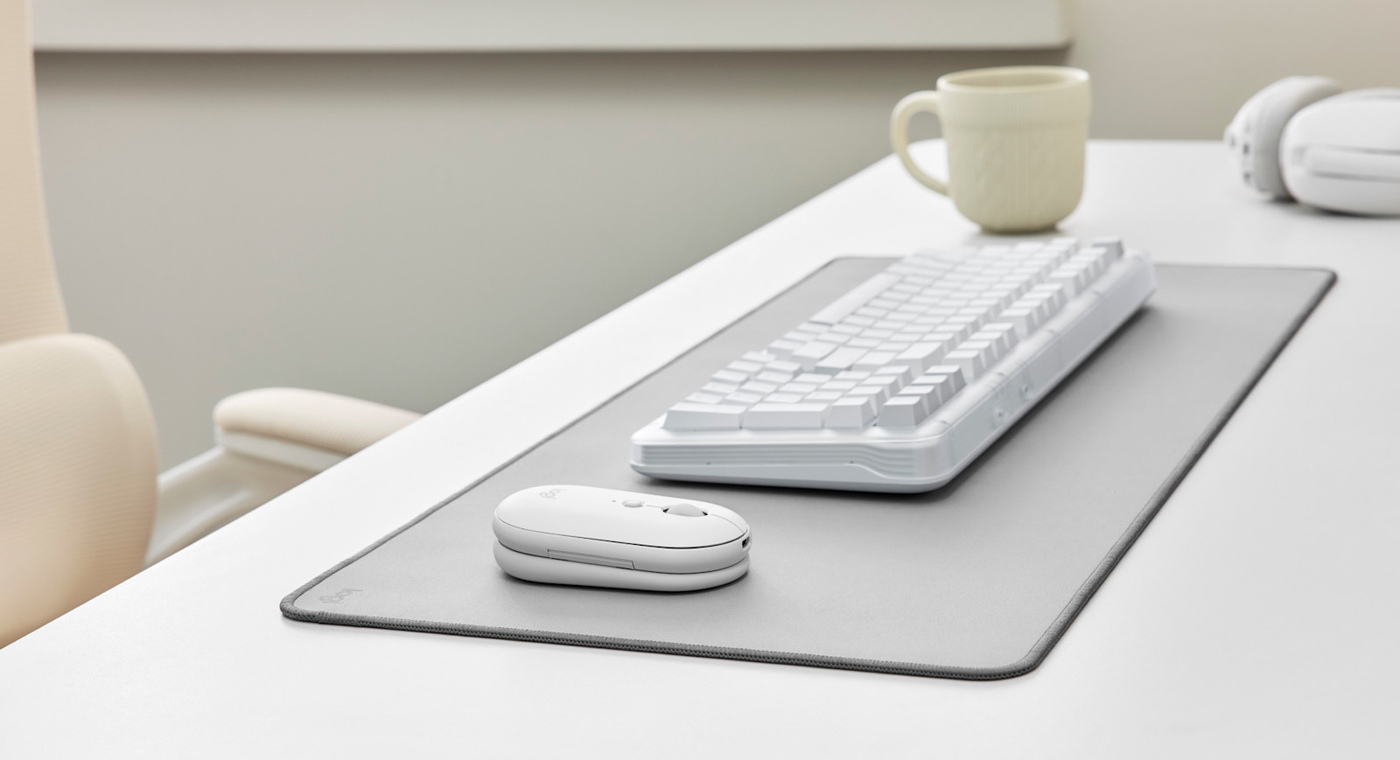 The Pebble Up in Off-White on a desk setup.