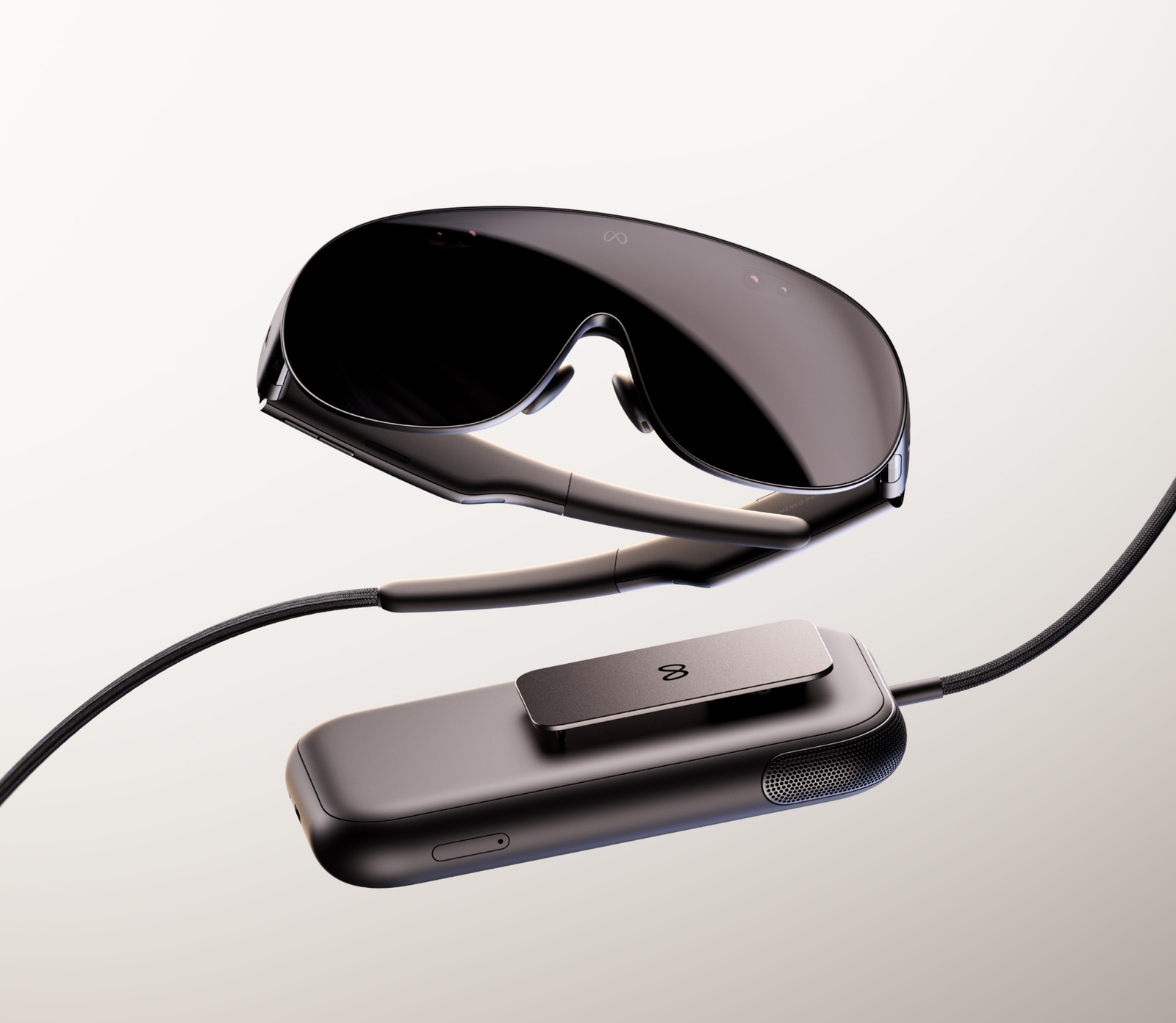Meta VR Glasses, a dark visor wired to a clip-on compute puck