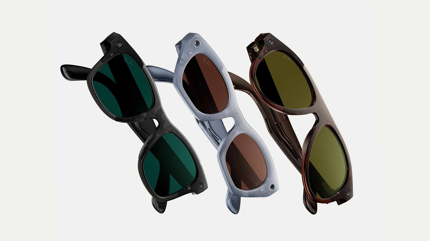 Three Ray-Ban Meta camera glasses in green, gray, and tortoise
