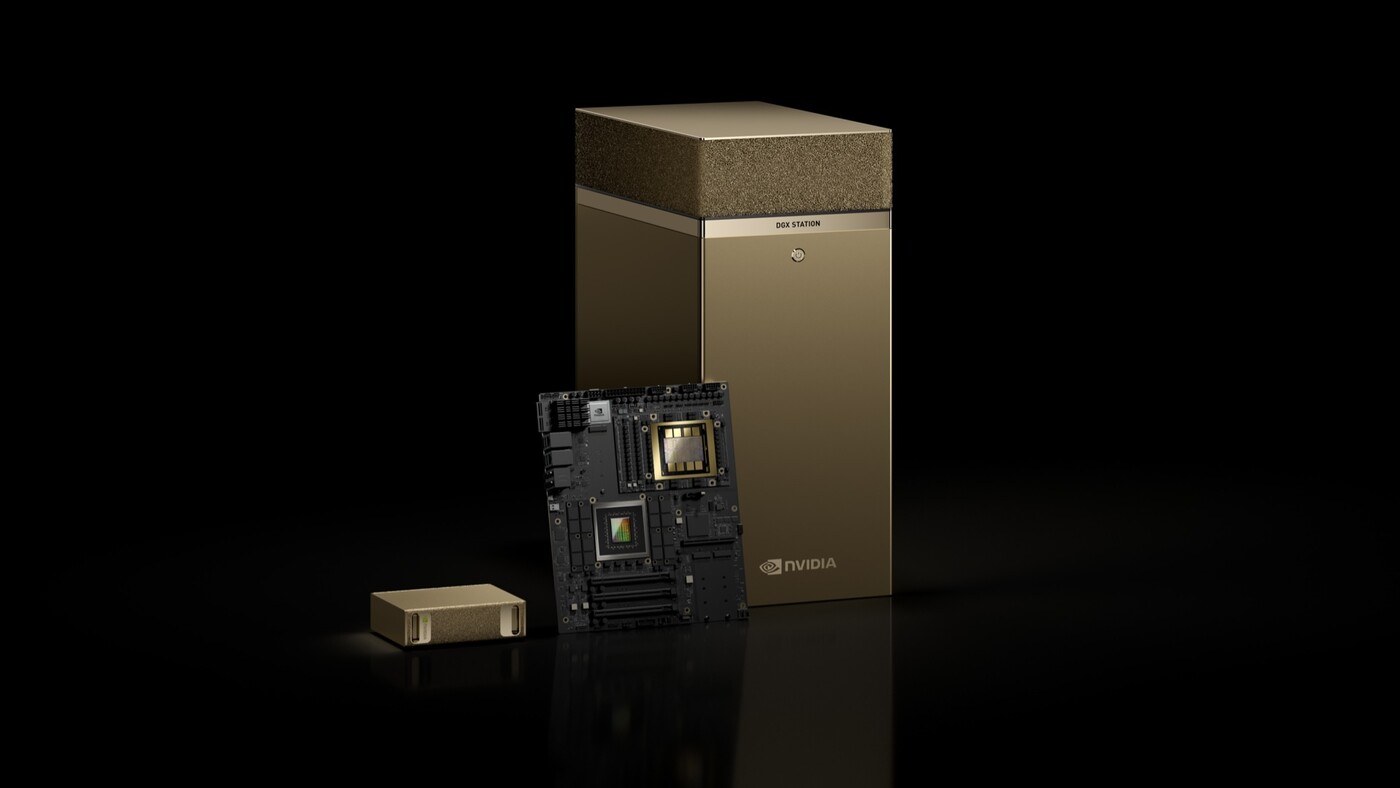 Gold DGX Station tower with a motherboard and a small DGX Spark box
