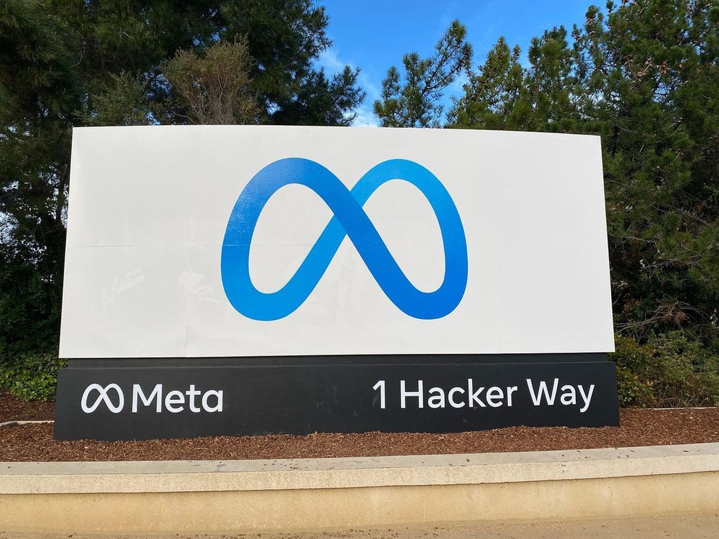 Entrance sign at Meta’s headquarters, 1 Hacker Way, Menlo Park, California