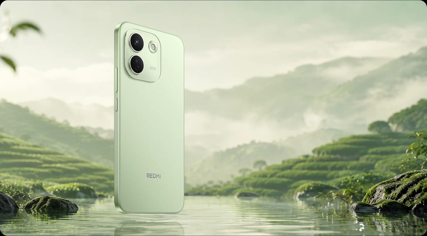 Redmi phone in green standing in water in front of terraced hills