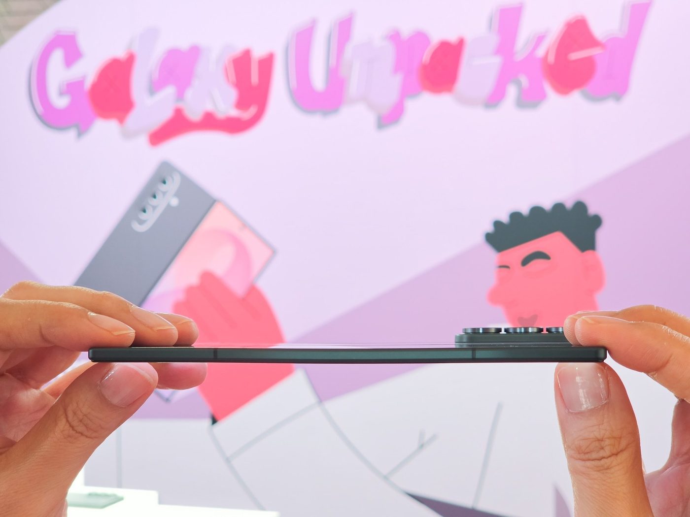 Hands holding a Galaxy Z Fold 8 open to show how thin the unfolded phone is