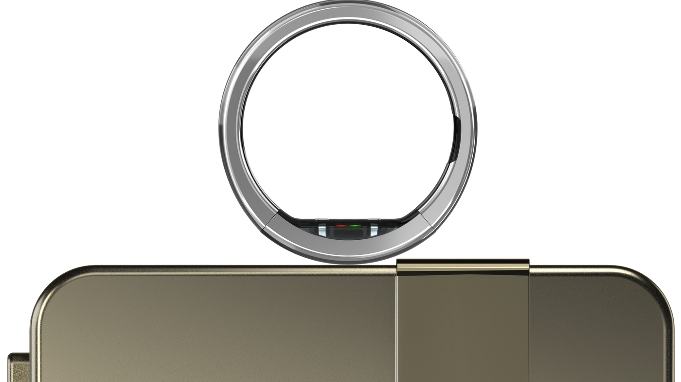 The Ultrahuman Ring Pro on its charging case