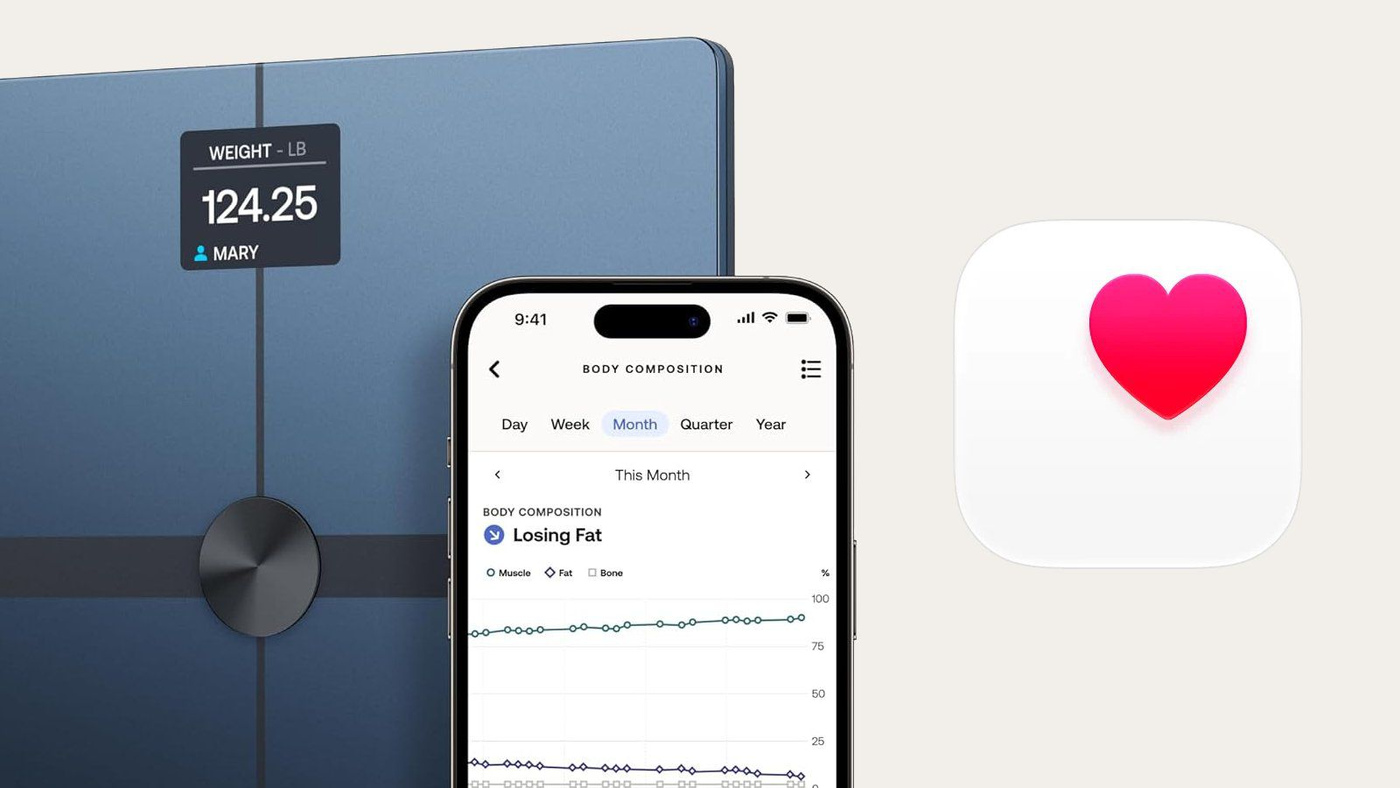 A Withings scale beside an iPhone running Apple Health