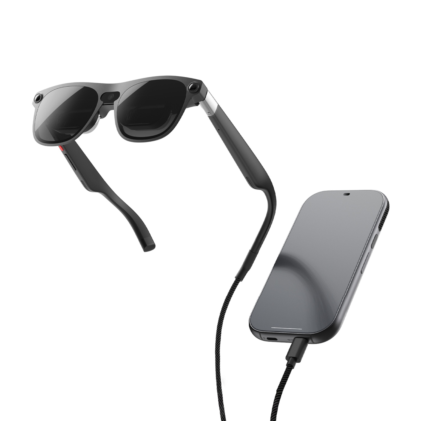 The Aura glasses and the tethered compute puck that holds the chip and battery.