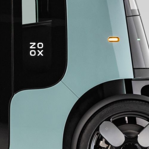 Zoox wordmark on the side of a robotaxi