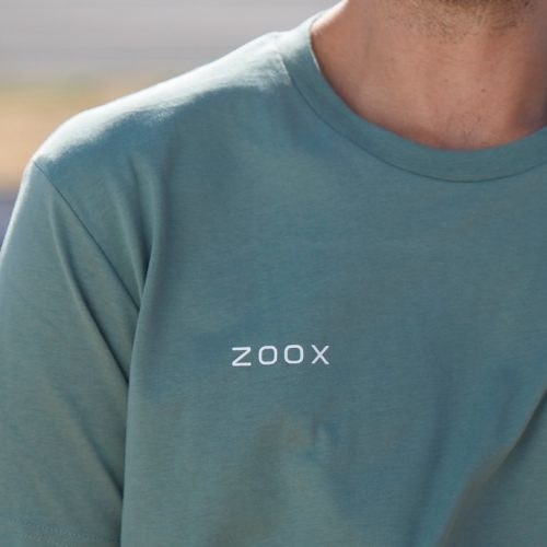A Zoox-branded shirt, from the company’s press stills